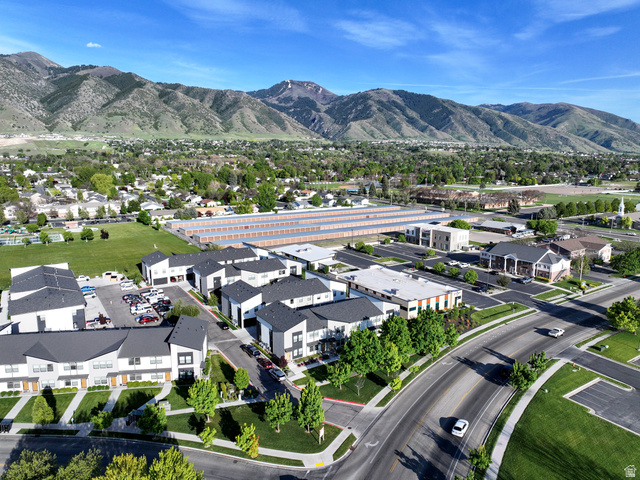 220 Spring Creek Parkway Providence, UT 84332 - Photo 15 of 17 New construction multi-story properties with dark shingle roofs