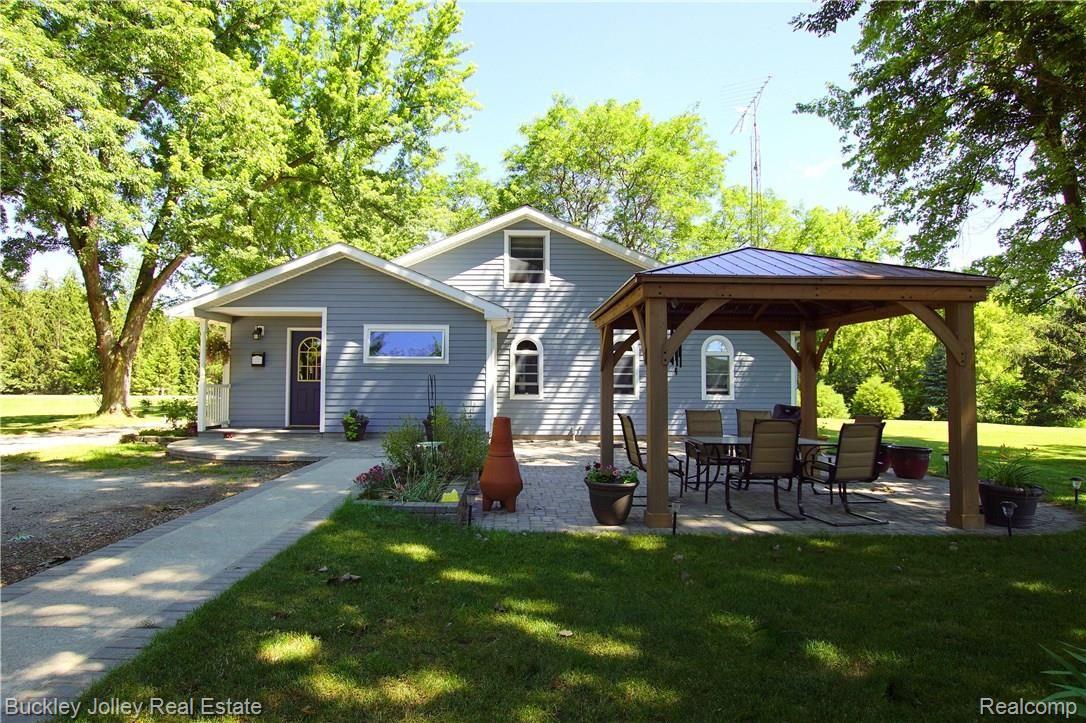 2986 Faussett Road Howell, MI 48855 - Photo 17 of 28 Covered Paver Patio