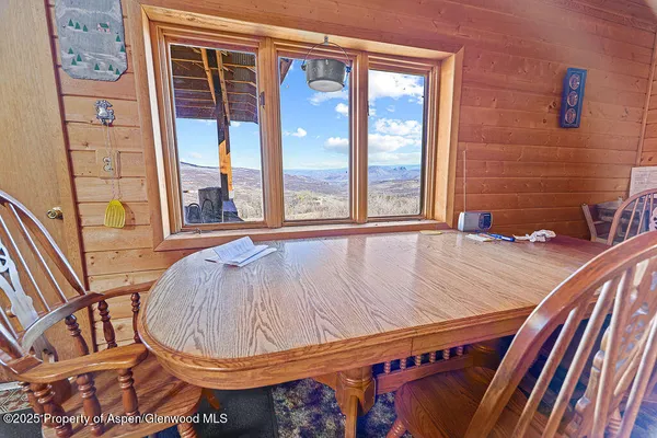 a view of a balcony dining area