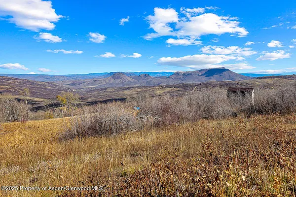 a view of lake with mountain