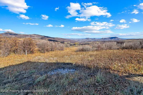 a view of lake with mountain