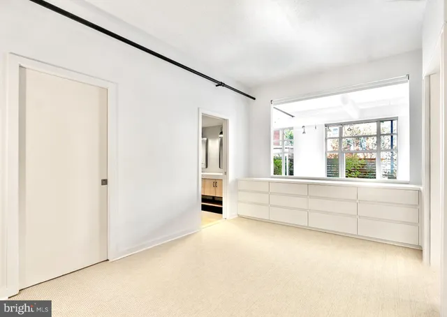 a large white tub with white walls