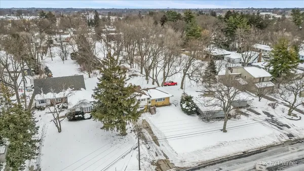 a view of a yard with a snow