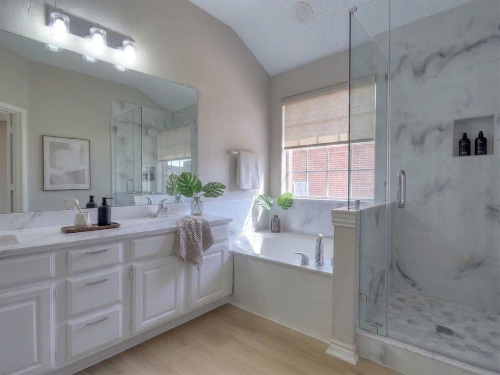 12000 Port Road Frisco, TX 75035 - Photo 26 of 40 Bathroom featuring a dual vanity with white cabinetry and a white countertop