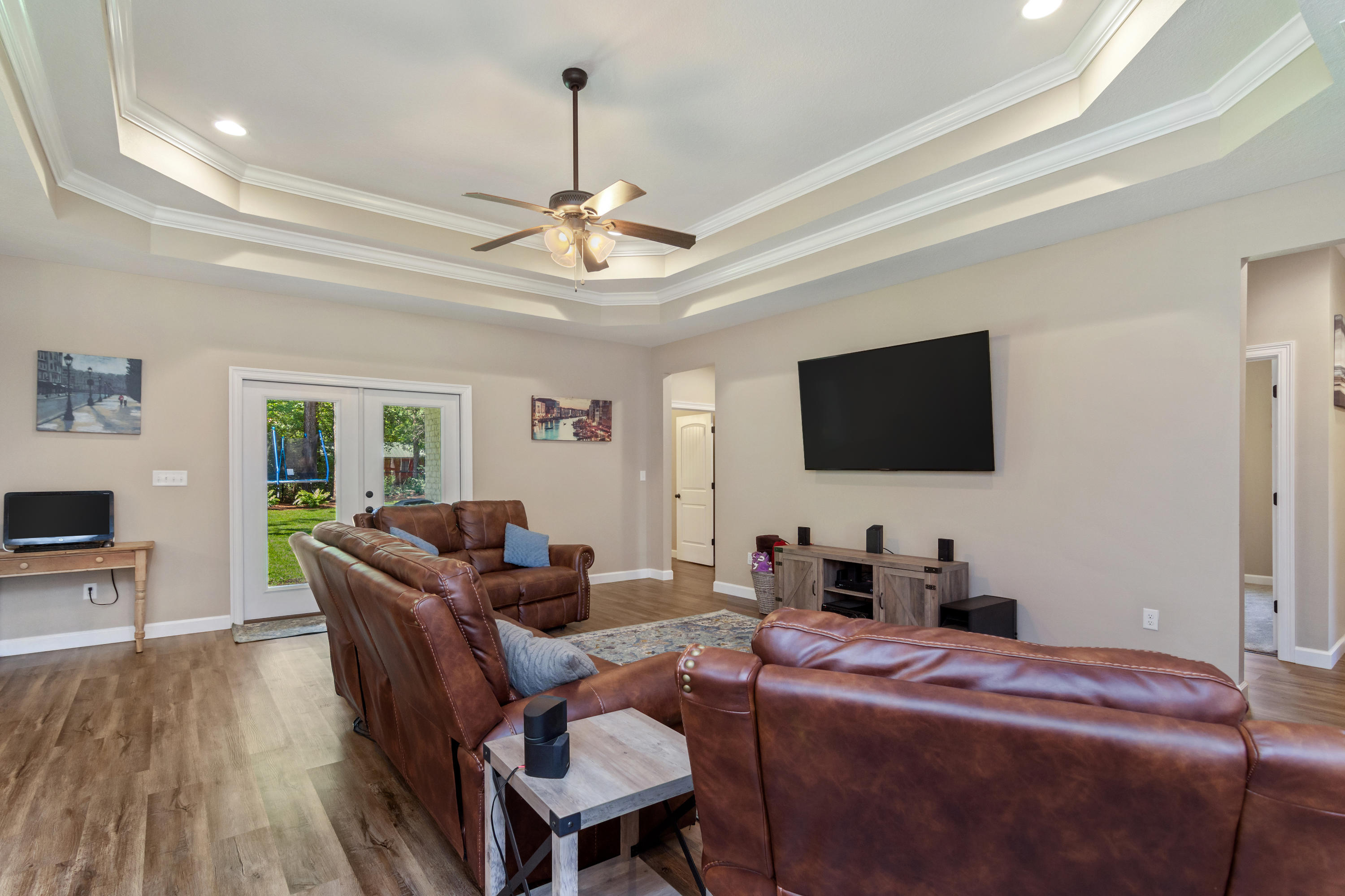 6076 Carina Road Crestview, FL 32539 - Photo 11 of 38 a living room with furniture and a flat screen tv