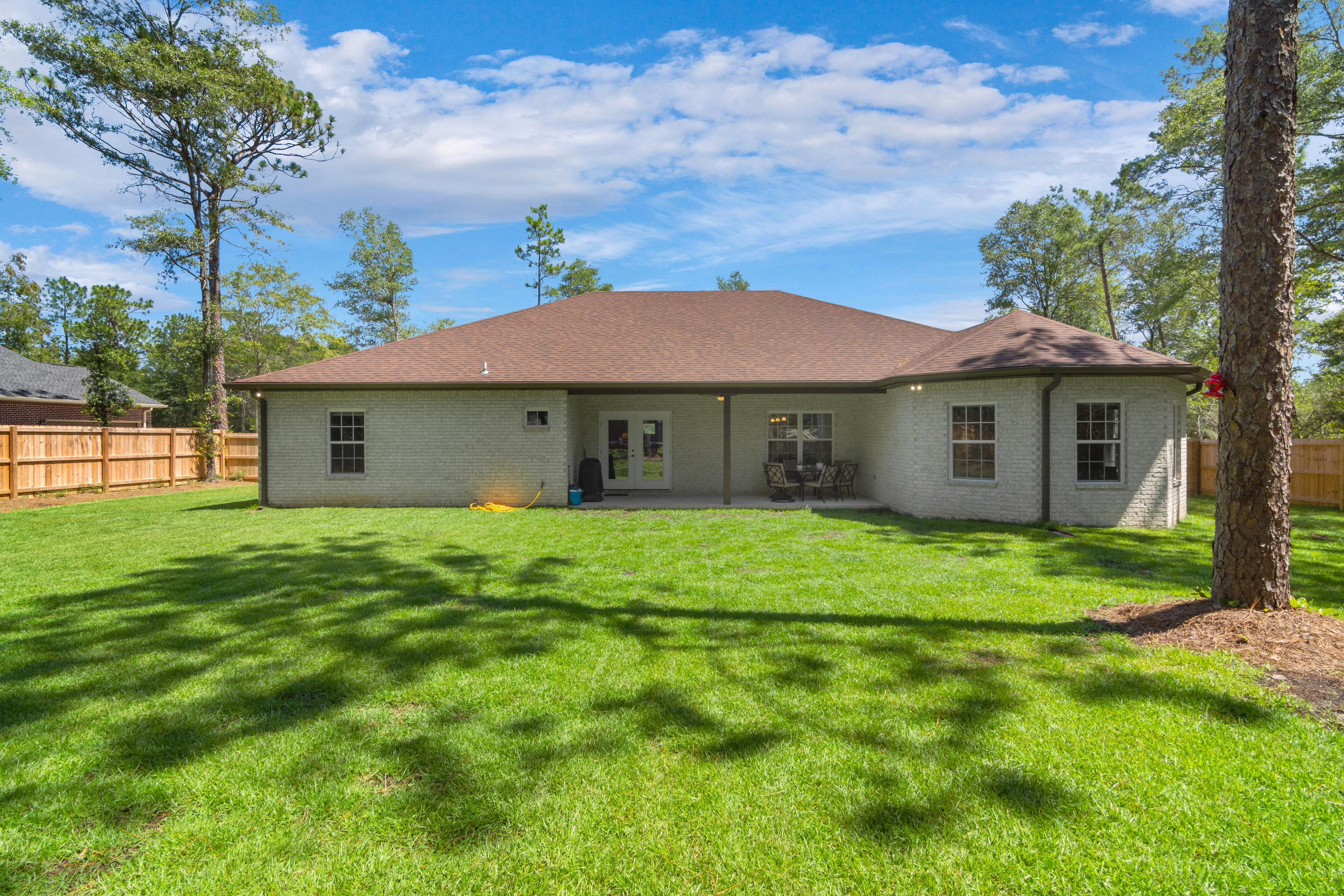 6076 Carina Road Crestview, FL 32539 - Photo 38 of 38 a view of a house with a yard