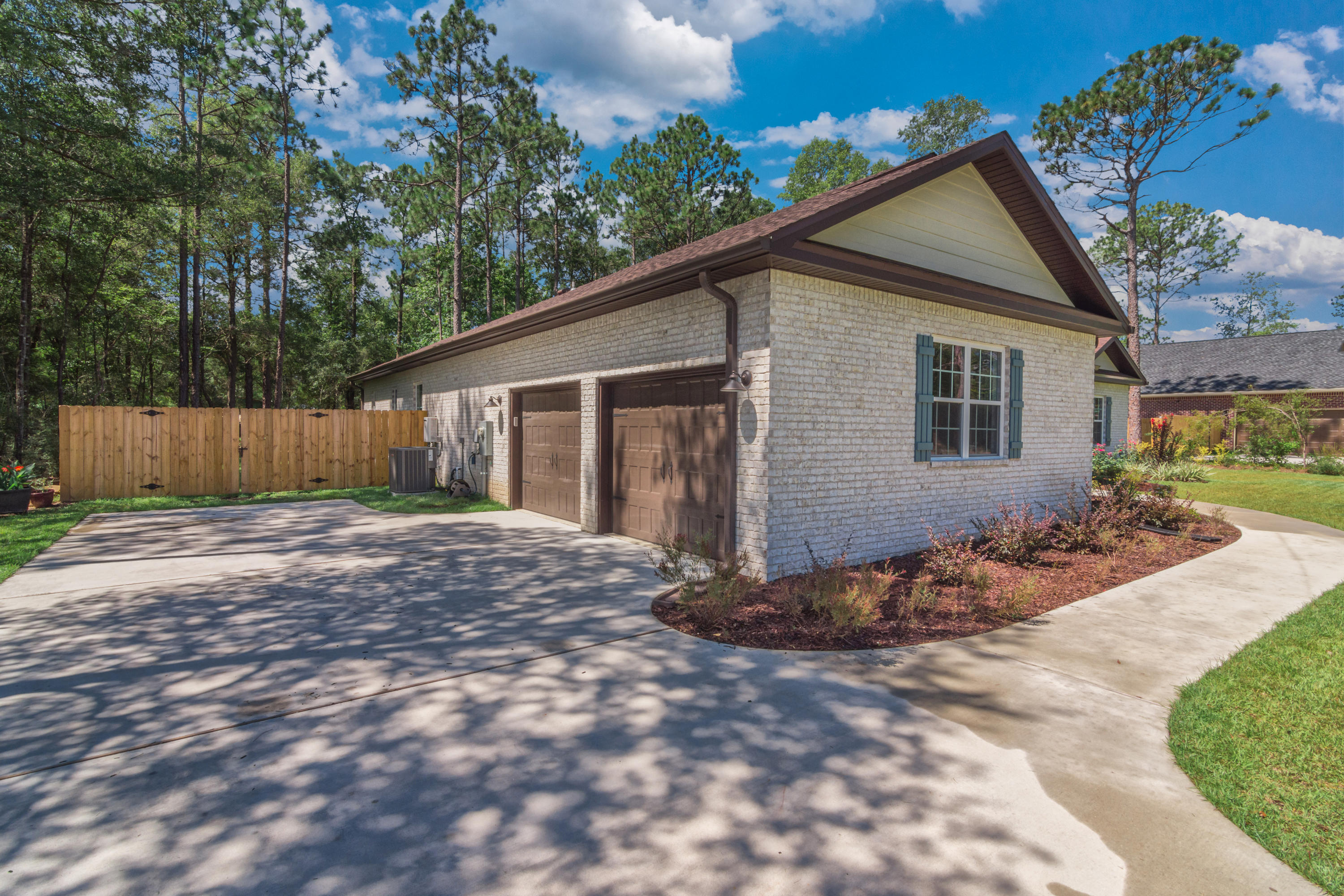6076 Carina Road Crestview, FL 32539 - Photo 6 of 38 a view of a house with a yard