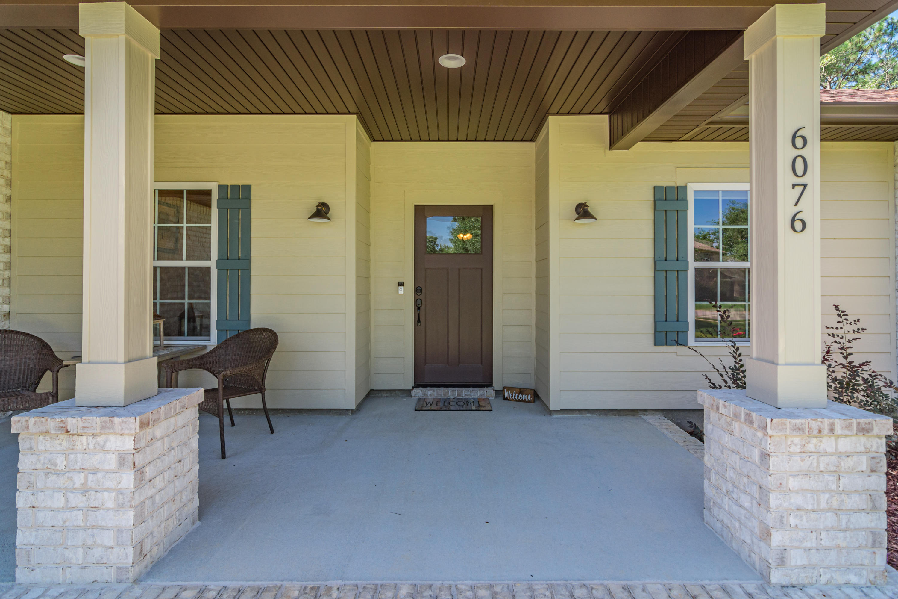 6076 Carina Road Crestview, FL 32539 - Photo 7 of 38 a view of an outdoor space with porch and furniture