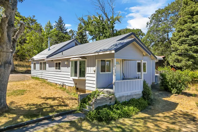 a house view with a garden space