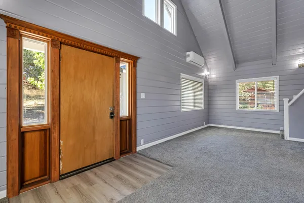 an empty room with windows