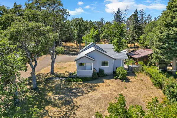 a house view with a garden space