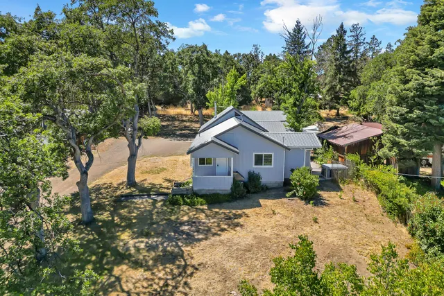 a house view with a garden space