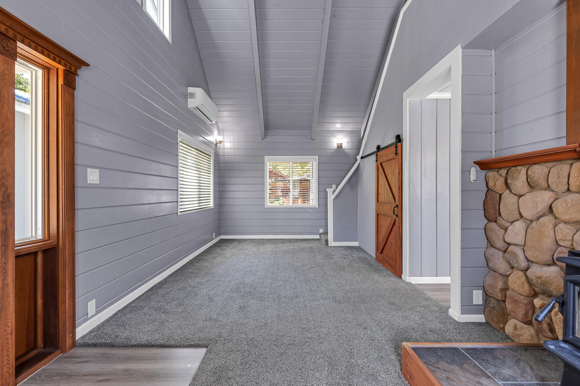 24898 Long Street Fall River Mills, CA 96028 - Photo 21 of 50 a view of an empty room with a fireplace