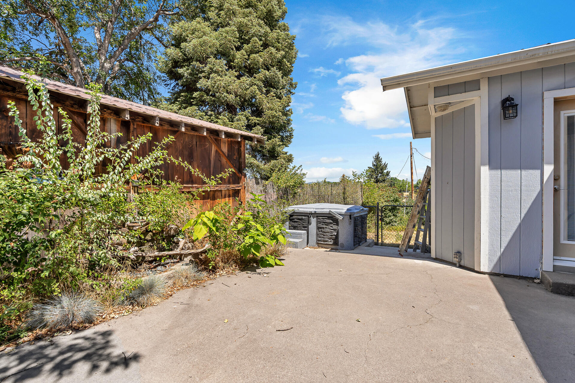 24898 Long Street Fall River Mills, CA 96028 - Photo 47 of 50 a pathway of a house with wooden fence