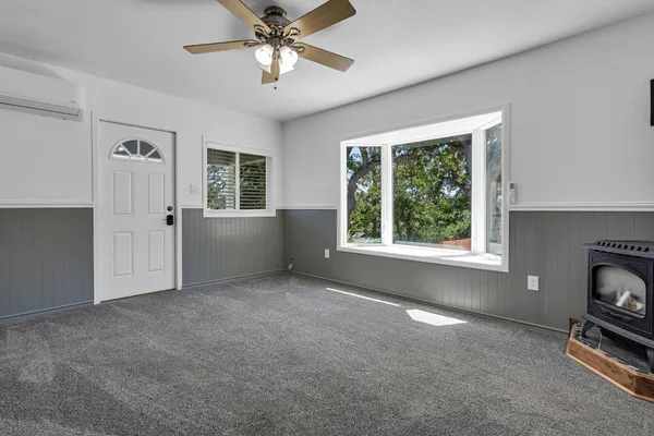 a view of livingroom with furniture window and fireplace