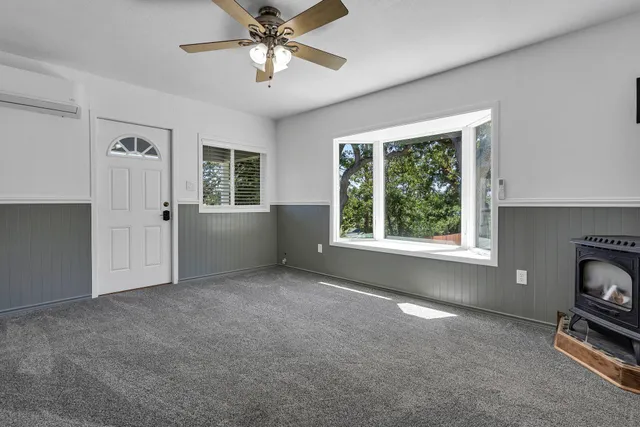 a view of livingroom with furniture window and fireplace
