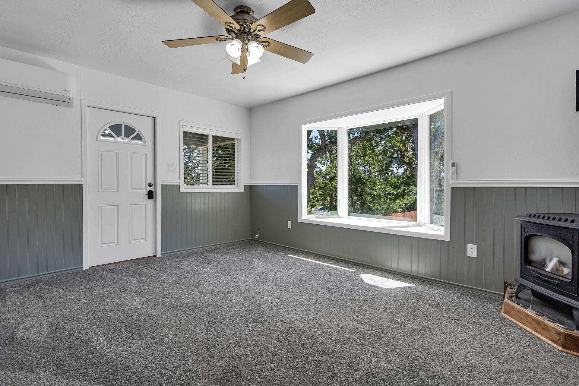 24898 Long Street Fall River Mills, CA 96028 - Photo 5 of 50 a view of livingroom with furniture window and fireplace
