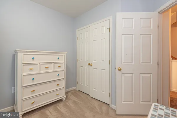 a view of a balcony with two chairs