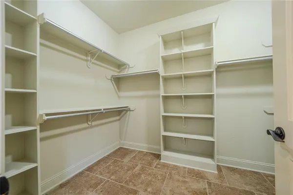 a view of an empty walk in closet