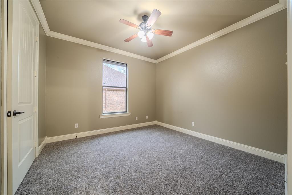 2114 West Hawkins Parkway Longview, TX 75605 - Photo 18 of 27 a view of an empty room with a window