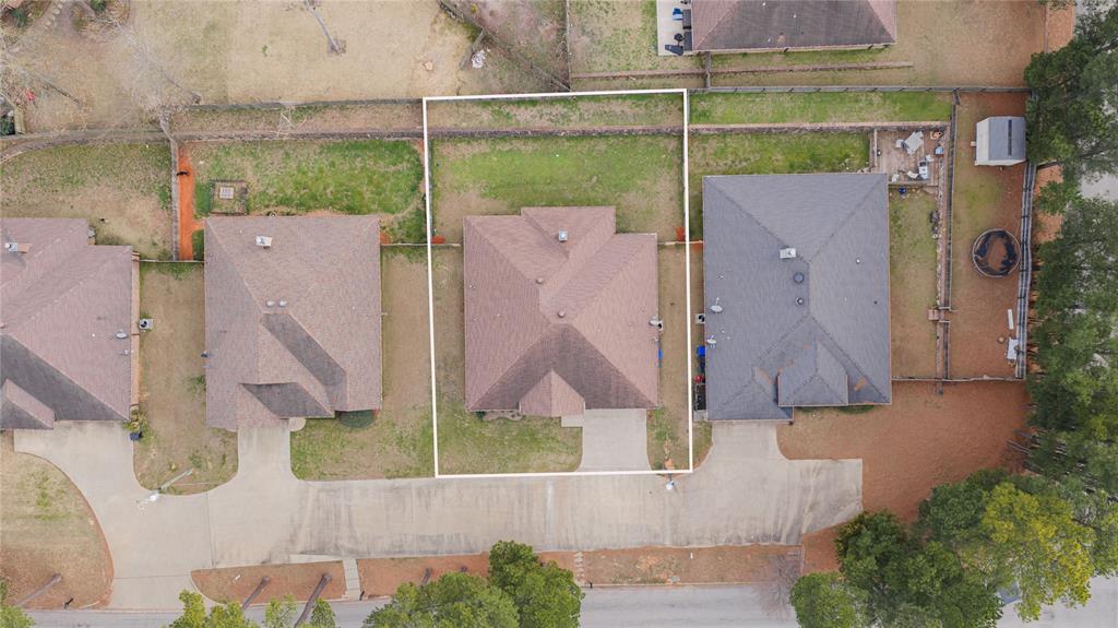 2114 West Hawkins Parkway Longview, TX 75605 - Photo 26 of 27 aerial view of a house with a backyard