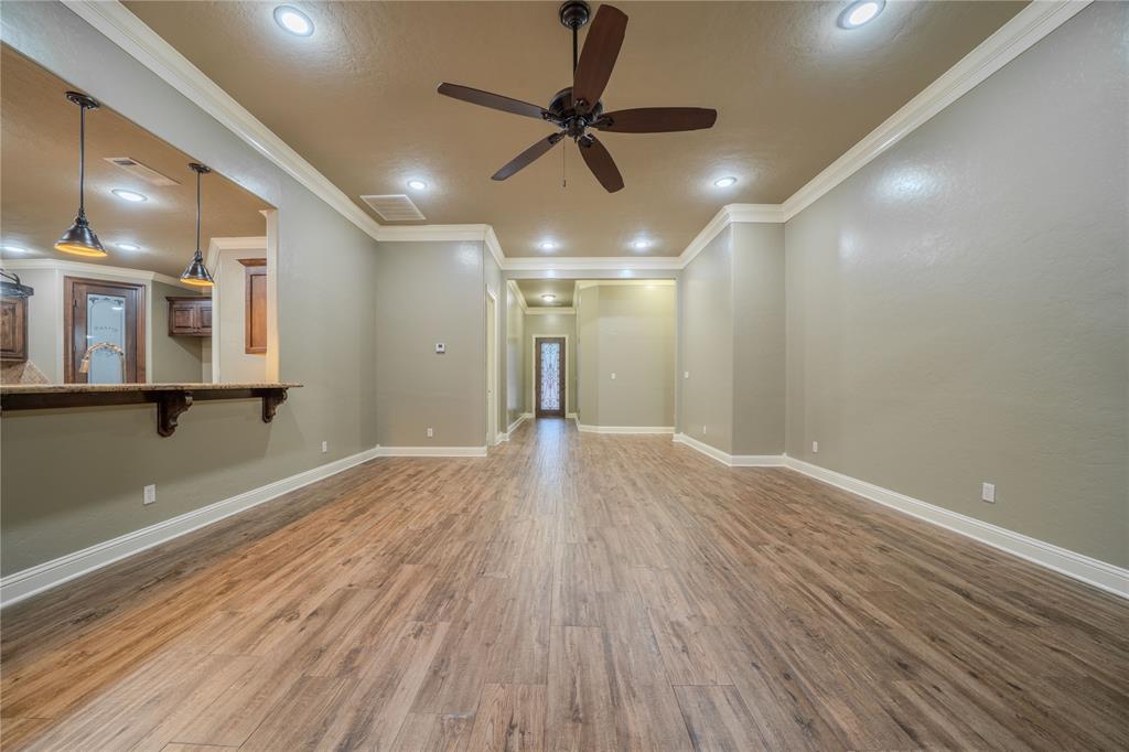 2114 West Hawkins Parkway Longview, TX 75605 - Photo 6 of 27 a view of empty room with wooden floor