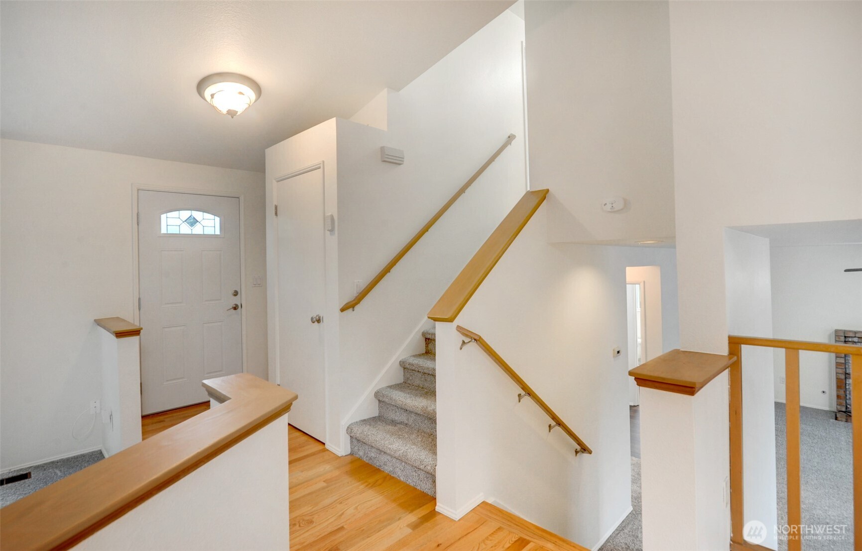 532 198th Street Southeast Bothell, WA 98012 - Photo 5 of 22 a view of a hallway with staircase