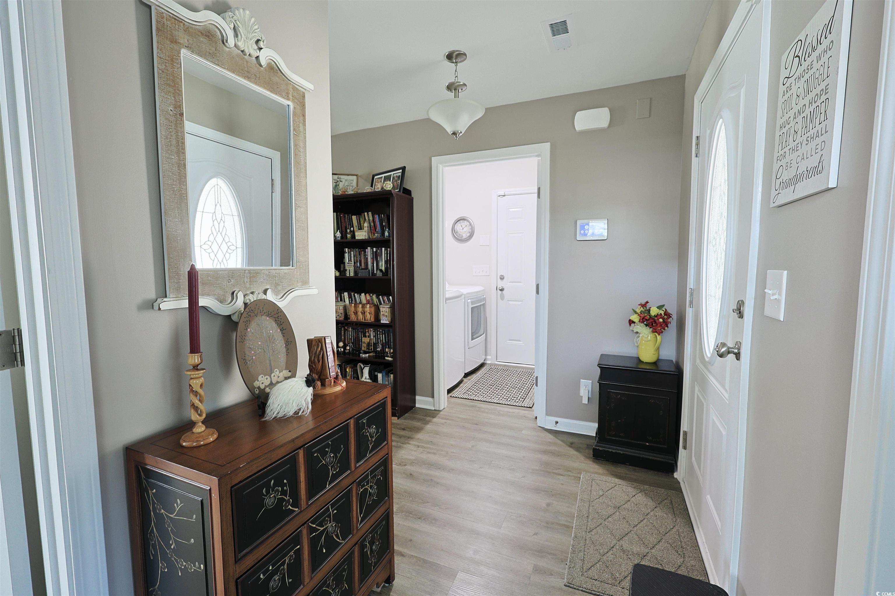 3604 Church Street Loris, SC 29569 - Photo 16 of 34 Entrance foyer featuring wood finished floors and baseboards