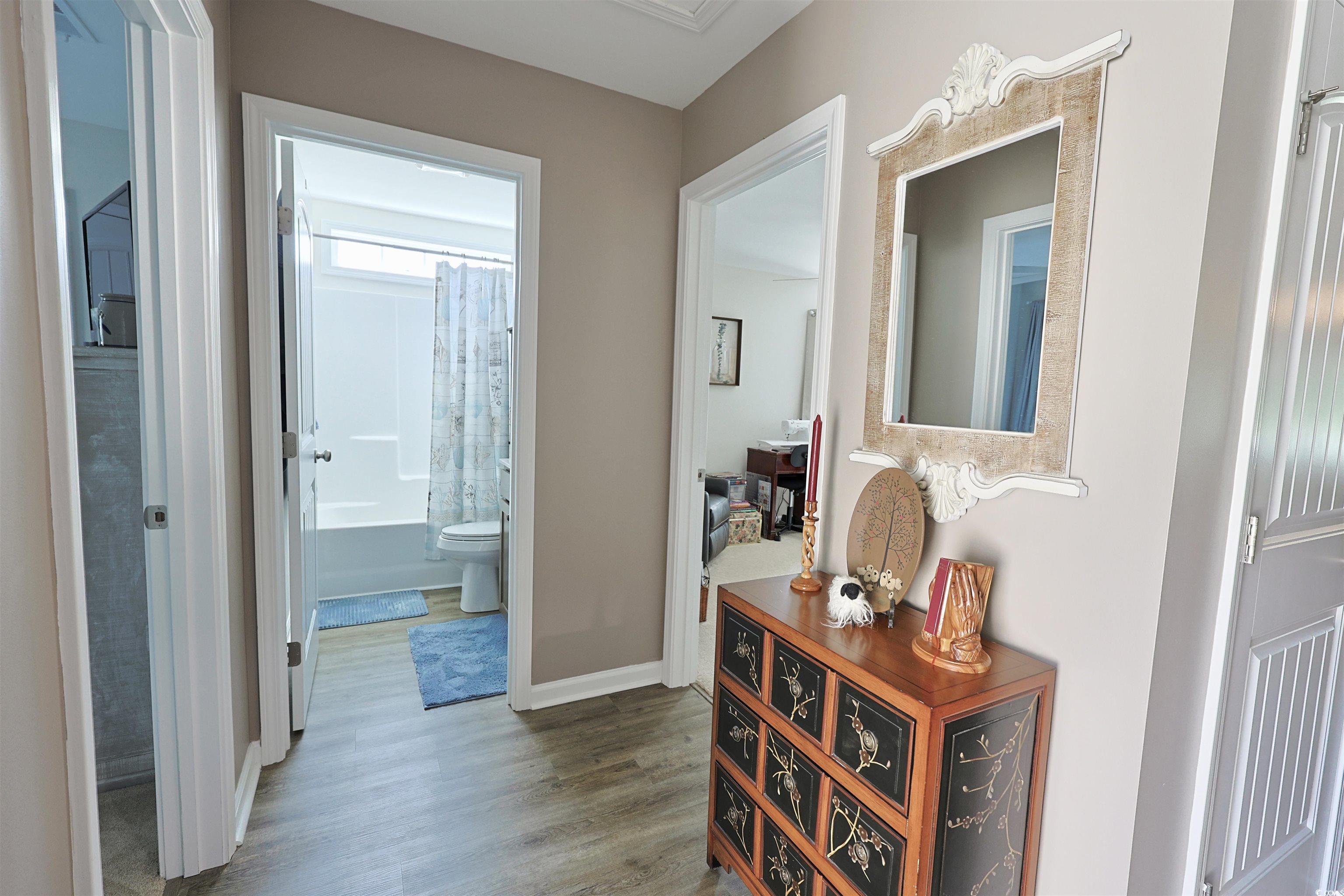 3604 Church Street Loris, SC 29569 - Photo 20 of 34 Hall with wood finished floors and baseboards