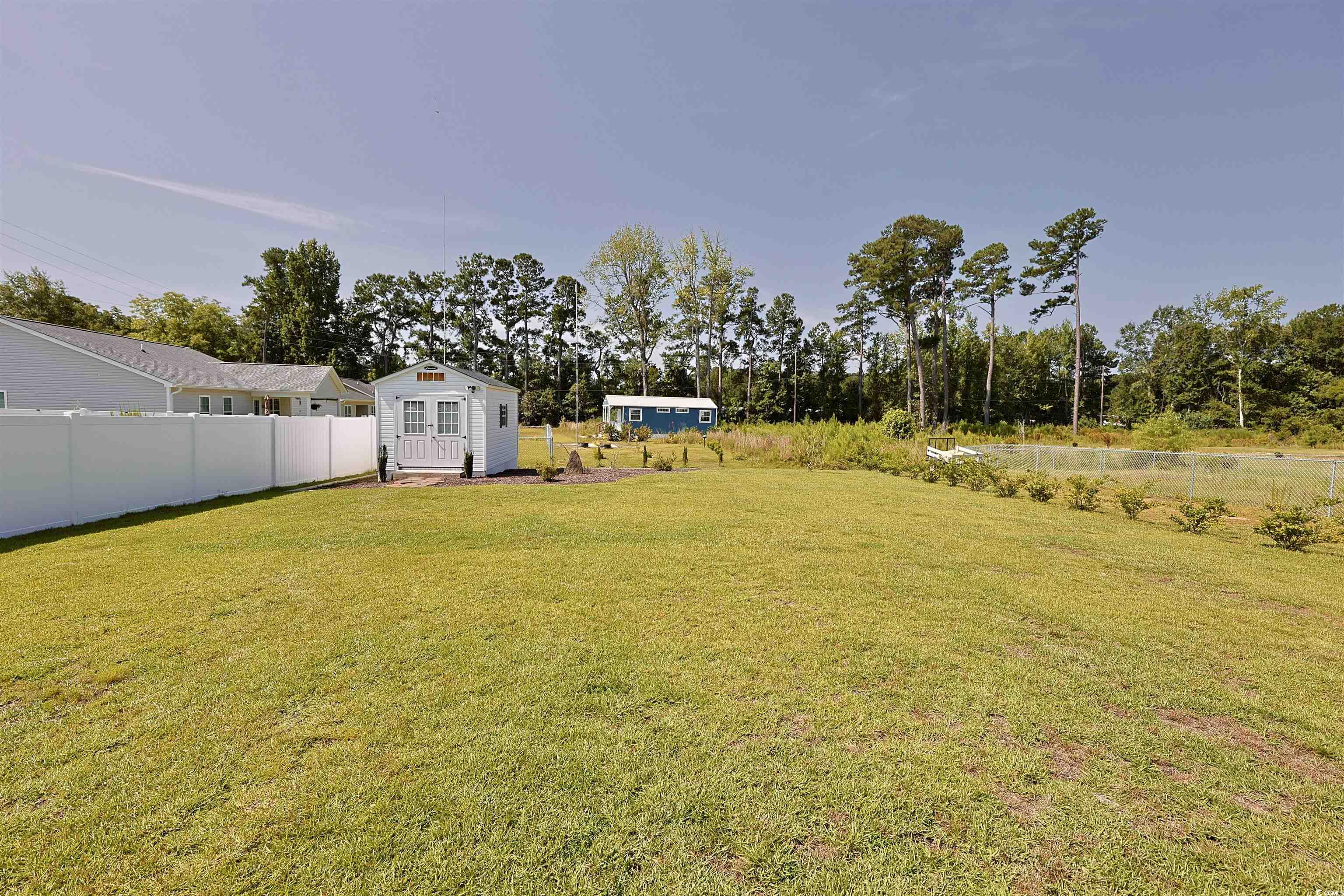 3604 Church Street Loris, SC 29569 - Photo 28 of 34 View of yard featuring a storage shed