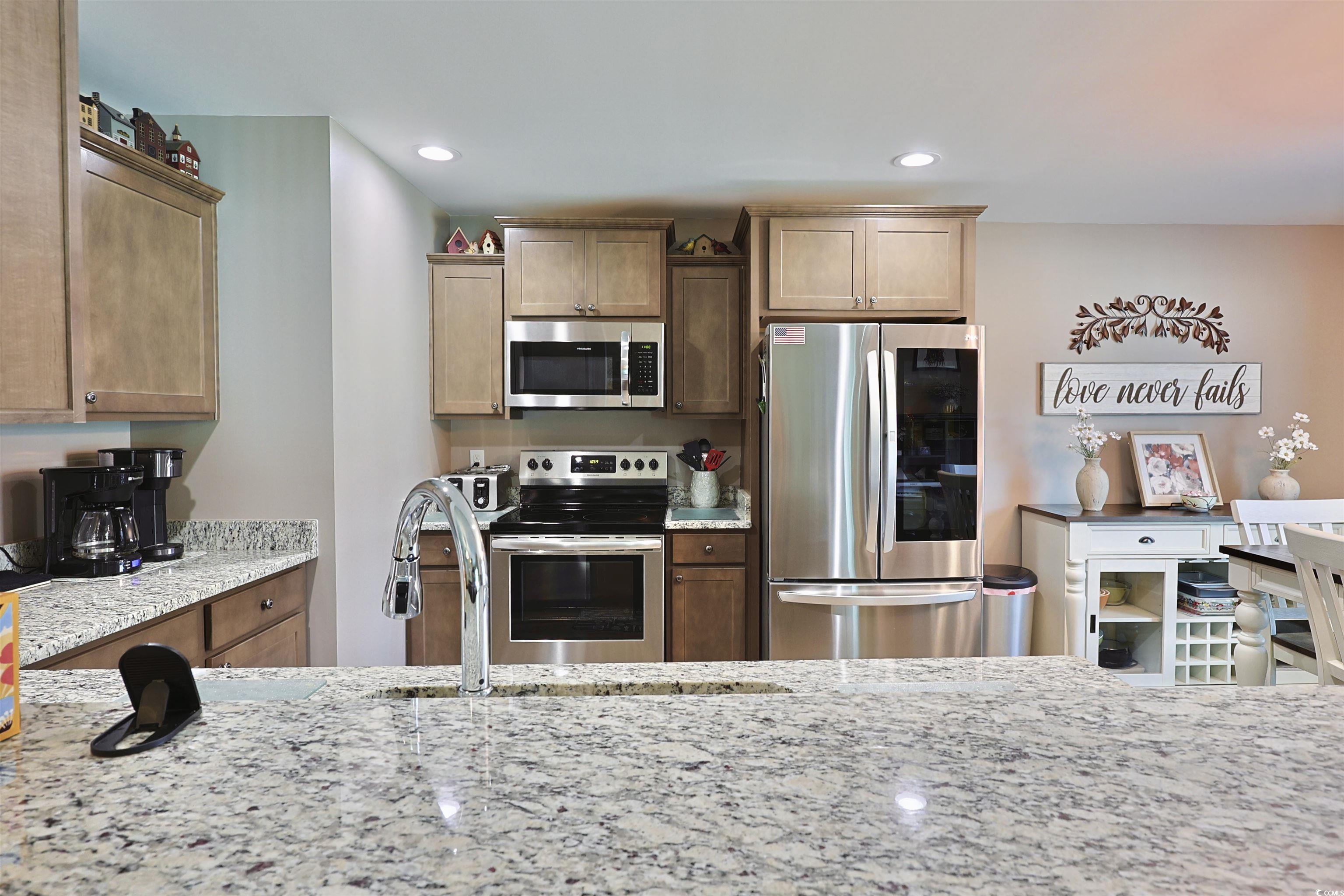 3604 Church Street Loris, SC 29569 - Photo 7 of 34 Kitchen featuring stainless steel appliances, light stone countertops, and recessed lighting