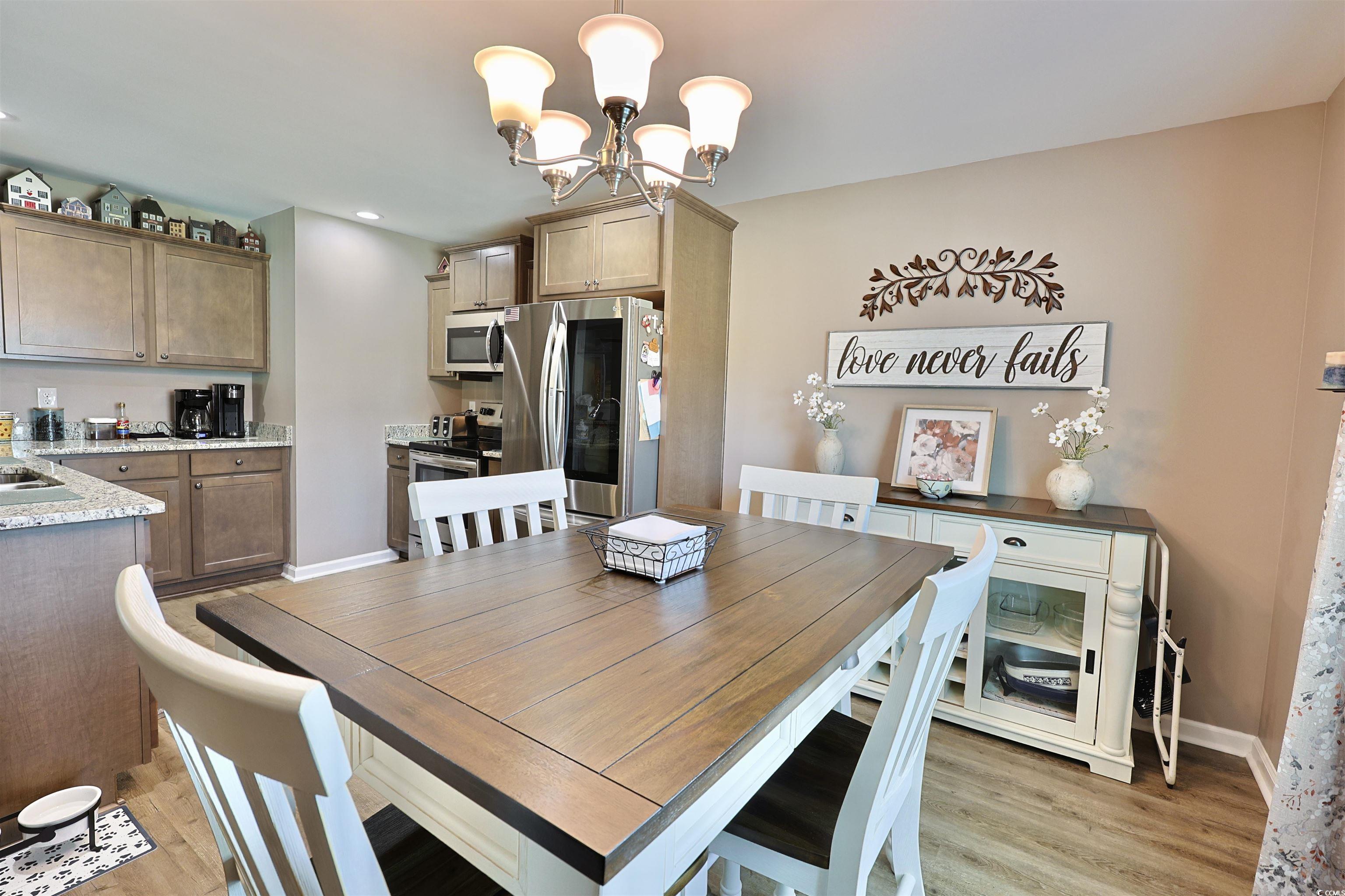 3604 Church Street Loris, SC 29569 - Photo 8 of 34 Dining room featuring a chandelier, light wood-type flooring, and recessed lighting