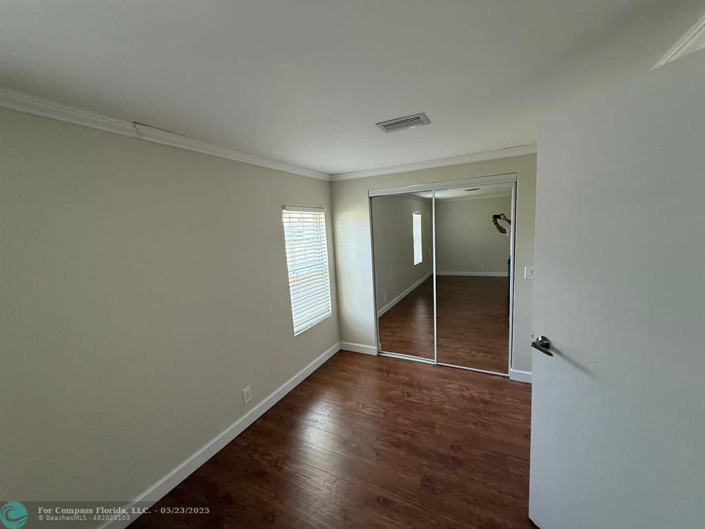 8550 Southwest 23rd Place Davie, FL 33324 - Photo 8 of 9 wooden floor in an empty room
