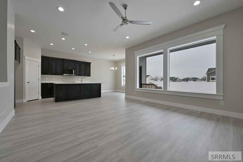3653 Eugene Avenue Ammon, ID 83406 - Photo 2 of 16 Great Room to Kitchen/Dining Area