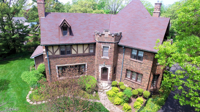 1201 Chatfield Road Winnetka, IL 60093 - Photo 2 of 25 an aerial view of a house with a yard and plants
