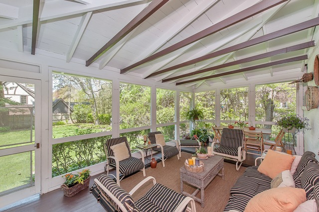 1201 Chatfield Road Winnetka, IL 60093 - Photo 22 of 25 a living room with furniture and floor to ceiling windows