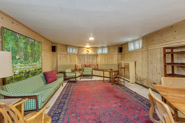 1201 Chatfield Road Winnetka, IL 60093 - Photo 23 of 25 a living room with patio furniture and a rug