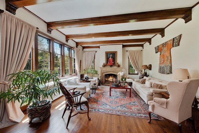 1201 Chatfield Road Winnetka, IL 60093 - Photo 7 of 25 a living room with furniture and a fireplace