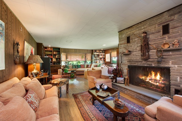 1201 Chatfield Road Winnetka, IL 60093 - Photo 8 of 25 a living room with furniture a fireplace and a large window