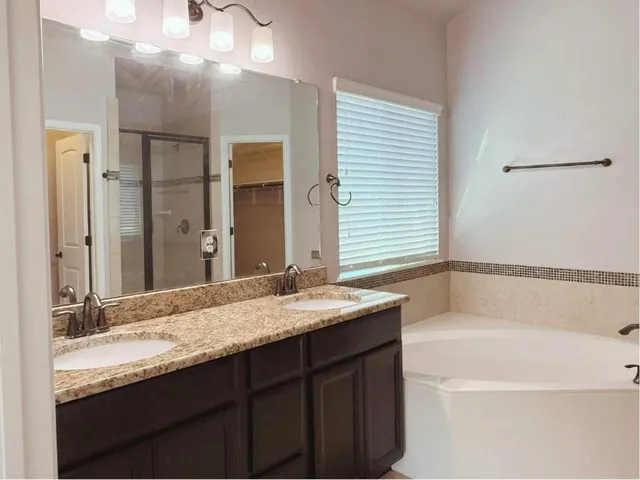 a view of an empty room with closet area