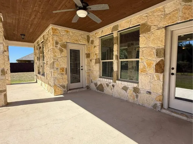 a view of an ocean from a mountain