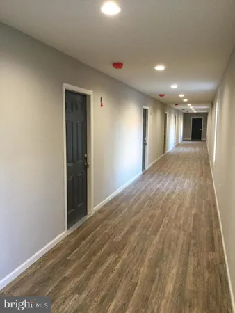 a view of hallway with a window