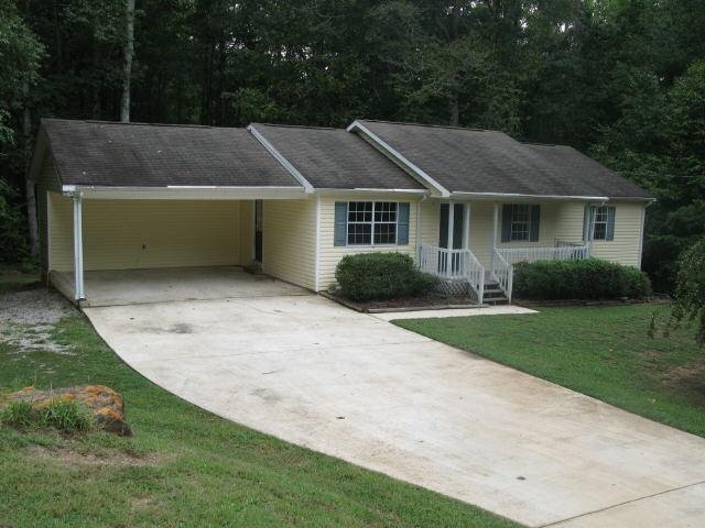 25 Avalee Road Brooks, GA 30205 - Photo 1 of 1 front view of house with a yard