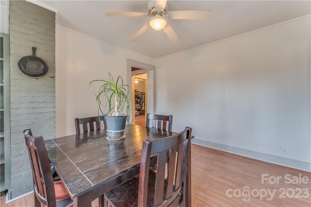26 Markley Drive East Flat Rock, NC 28726 - Photo 14 of 27 a view of a dining room with furniture and chandelier