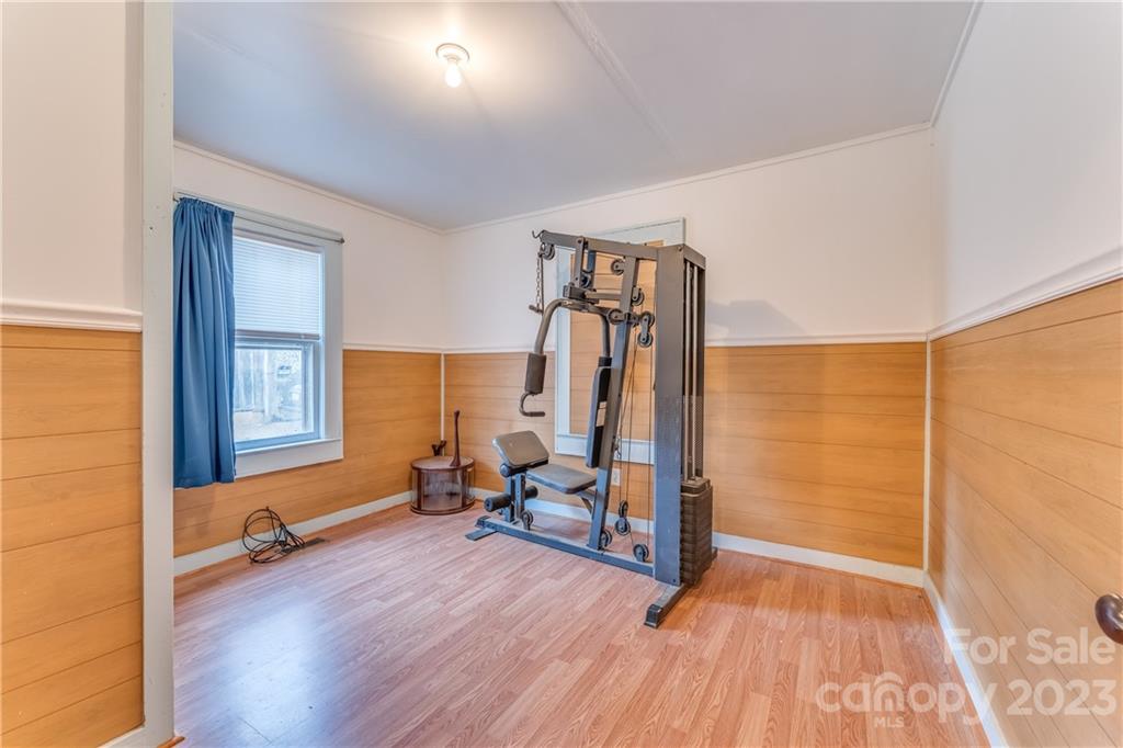 26 Markley Drive East Flat Rock, NC 28726 - Photo 17 of 27 a view of a room with gym equipment