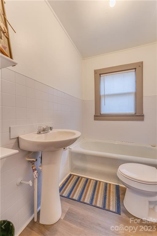 26 Markley Drive East Flat Rock, NC 28726 - Photo 24 of 27 a bathroom with a sink and a toilet