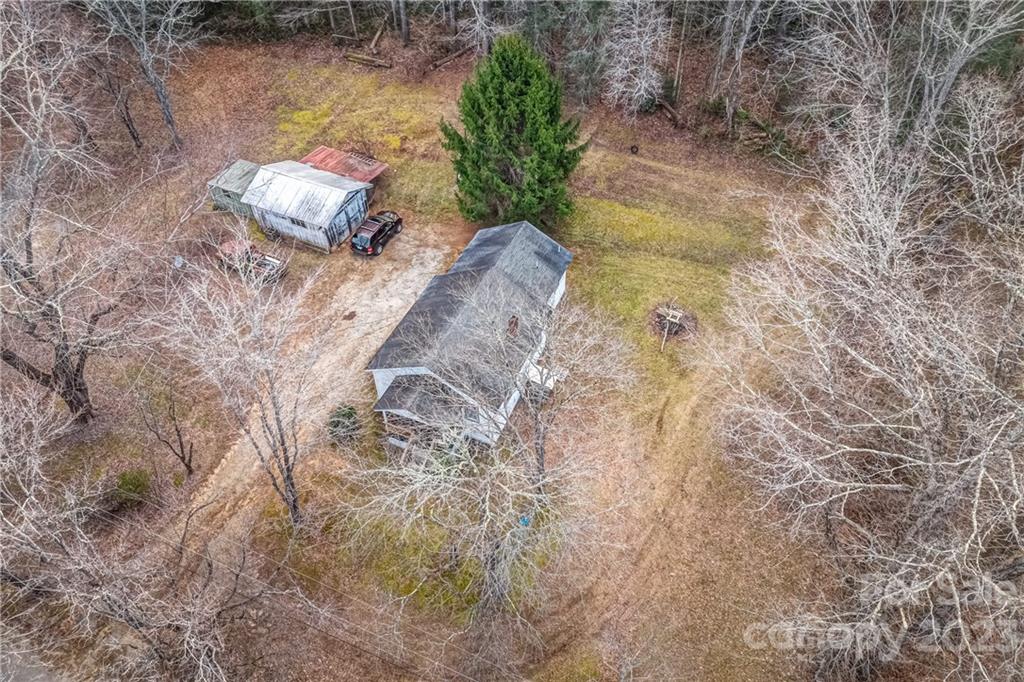 26 Markley Drive East Flat Rock, NC 28726 - Photo 26 of 27 a vase of flowers sitting on a floor