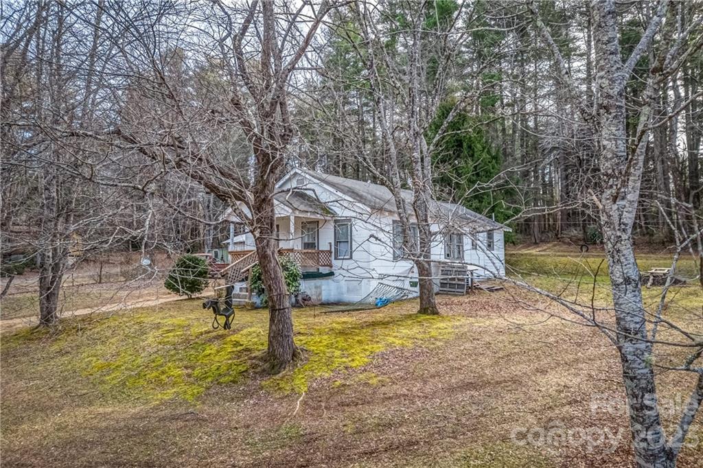 26 Markley Drive East Flat Rock, NC 28726 - Photo 3 of 27 a view of a house with swimming pool and sitting area