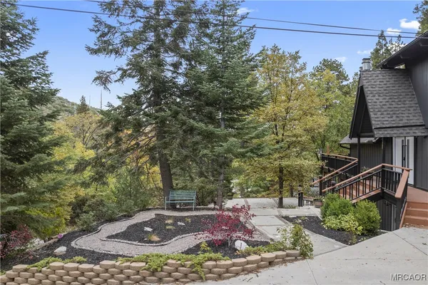 a view of a living room with a large window