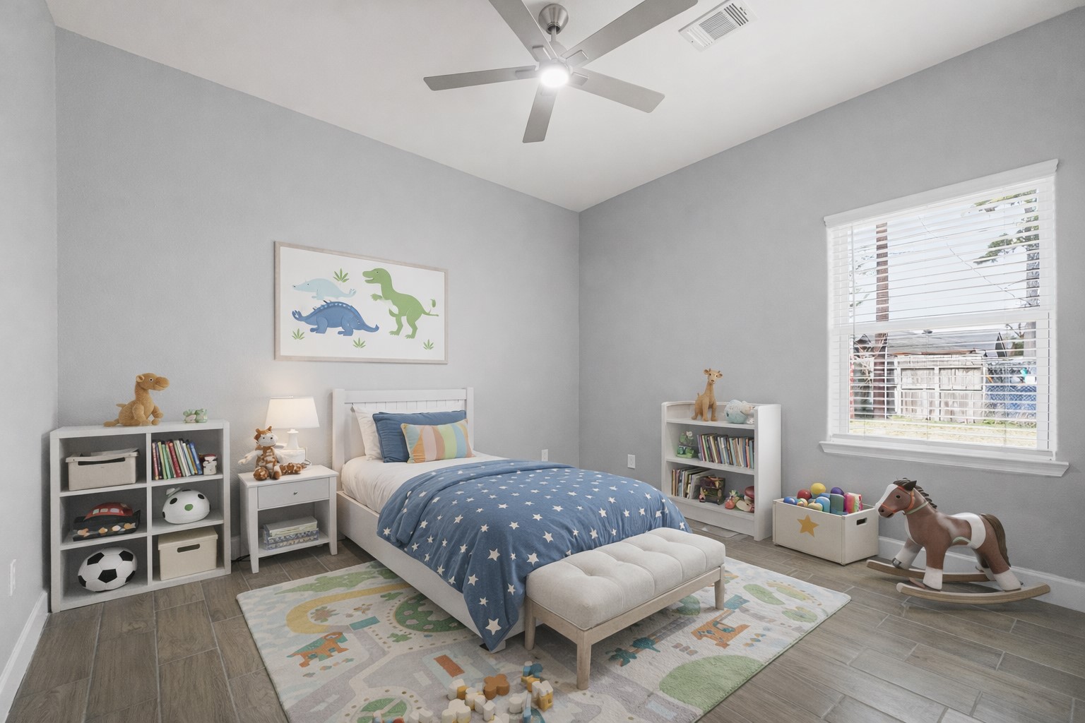 2448 Areba Street Houston, TX 77091 - Photo 13 of 19 Virtually staged. Bright secondary bedroom featuring soaring ceilings, tile flooring, and abundant natural light. This versatile space is perfect for a bedroom, guestroom, or home office, offering a comfortable layout with room to grow.
